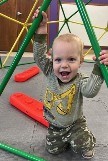 Children playing and learning at Brilliant Beginnings